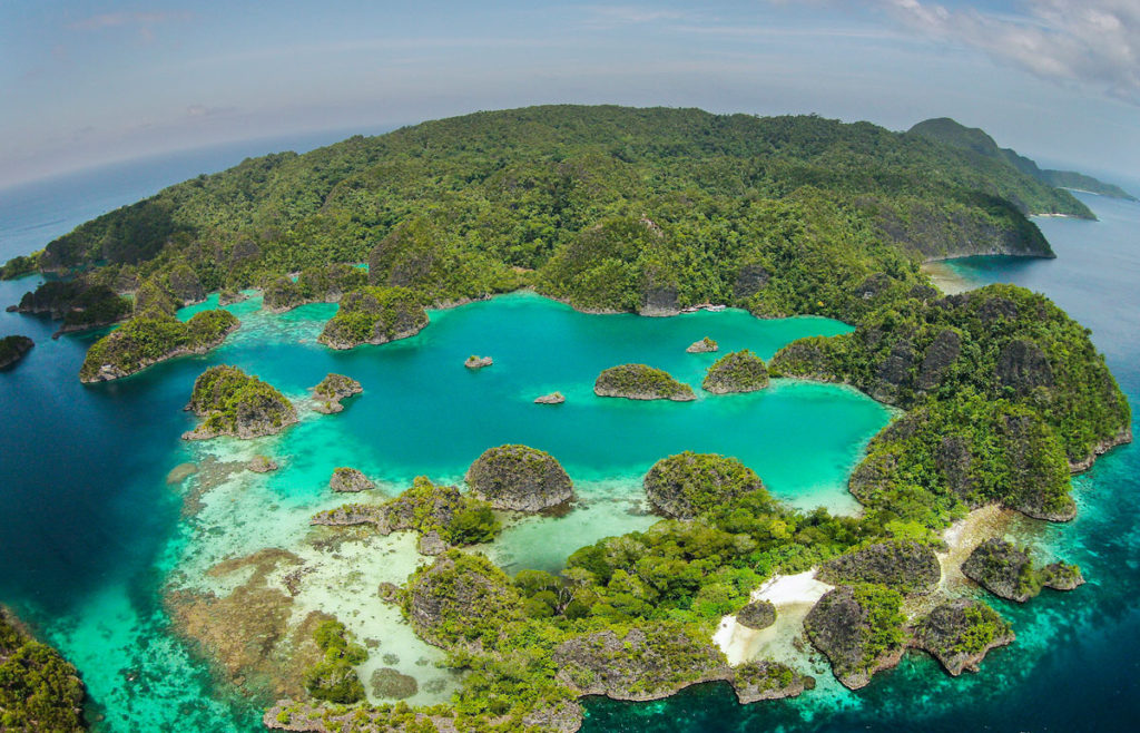 island panorama at penemu viewpoint on the fam islands in indonesia
