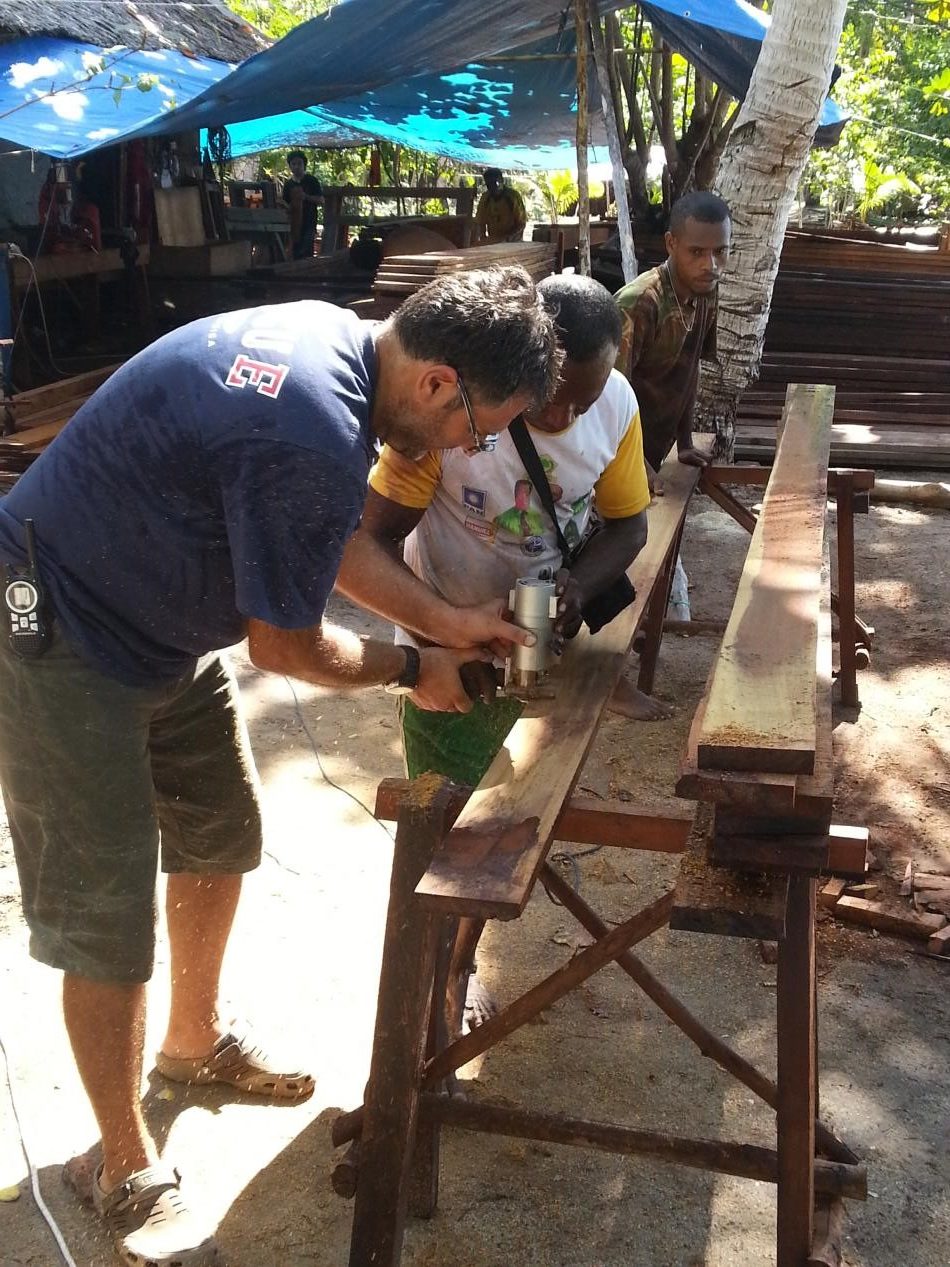 Wood preparation during the construction of Papua Explorers Eco Resort