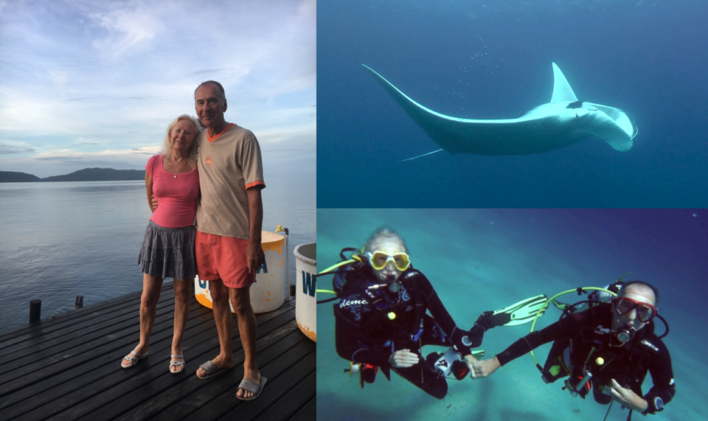 two of our guests at Papua Explorers dive centre, while diving and a manta ray