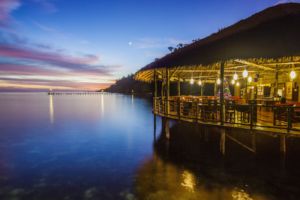 ambiance of our restaurant in Raja Ampat with a colorful evening sky