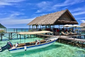 Diving Boat, sundeck and spa in the background at Papua Explorers in Raja Ampat