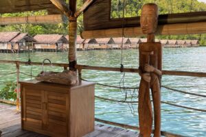 a lady getting a massage treatment at our Papua Explorers spa in Raja Ampat above the water