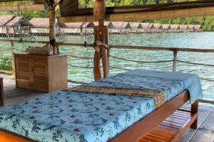 Our masseuses giving two ladies a massage at our Papua Explorers spa in Raja Ampat