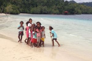 village kids at the beach on Batanta island in Raja Ampat