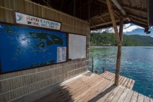 (English) at our dive center in Raja Ampat we have a large picture of the area featuring all the dive spots of the Dampier Straight and more